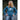 Smiling woman wearing deep heather teal unisex Kodiak Bear long sleeve tee, island lifestyle apparel for outdoor adventures and casual wear.