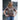 Woman wearing brown Wake Up Rock Life Repeat t-shirt by water in Kodiak Alaska – island lifestyle and adventure apparel