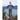 Boy wearing navy Wake Up Rock Life Repeat long sleeve shirt with Kodiak Alaska mountains in background – island adventure apparel