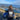 Girl riding ATV while wearing black Trail to the Catch thin hoodie, enjoying Kodiak island adventure, perfect outdoor and fishing lifestyle apparel