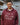 Man wearing maroon Adventure in Every Letter hoodie from the Wake Up. Rock Life. Repeat. Collection, outdoors by the water—cozy hoodie for camping, travel, and everyday adventure